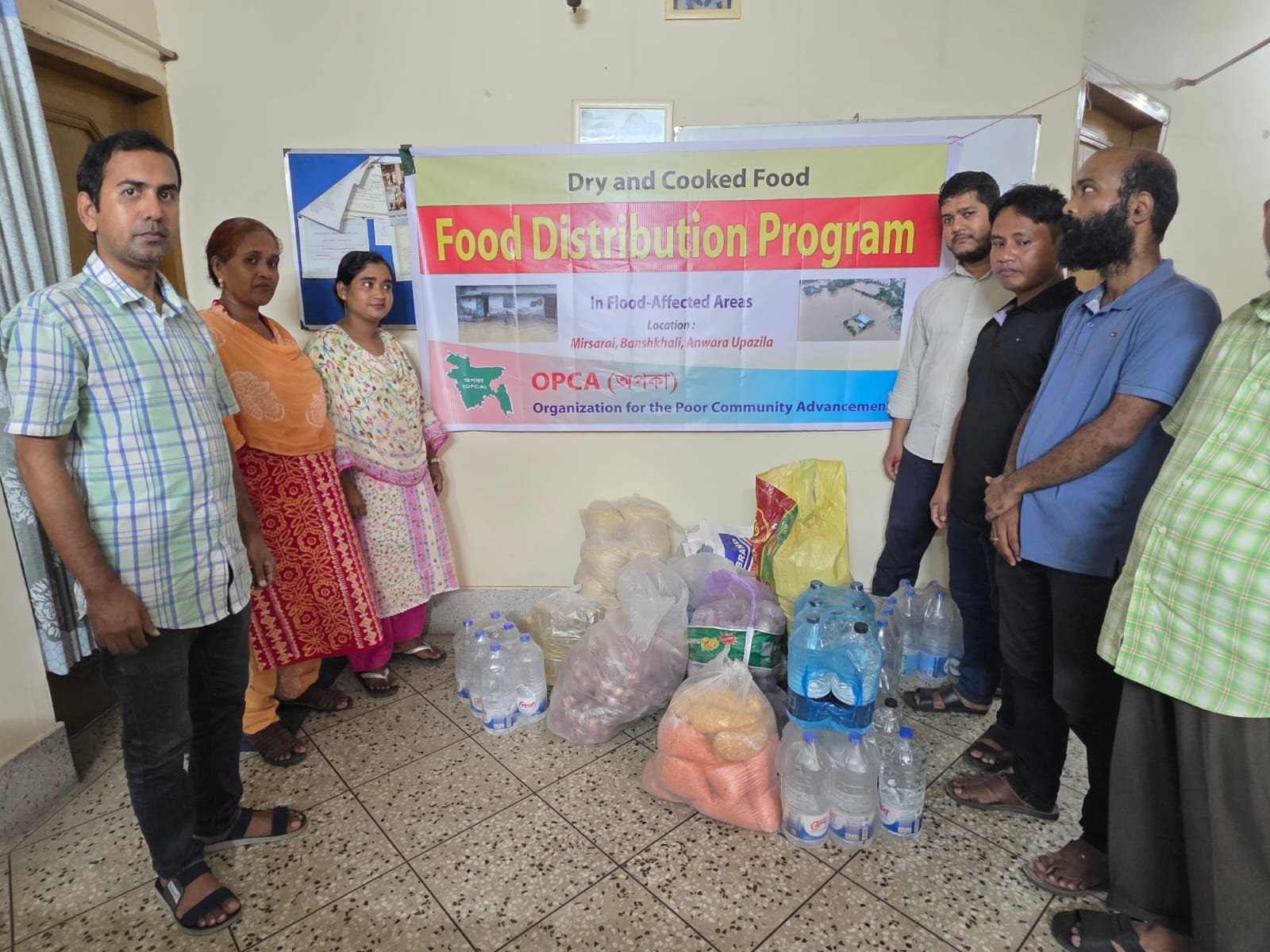 OPCA-distributes-emergency-food-assistance-to-300-flood-affected-families-in-banshkhali-upazila